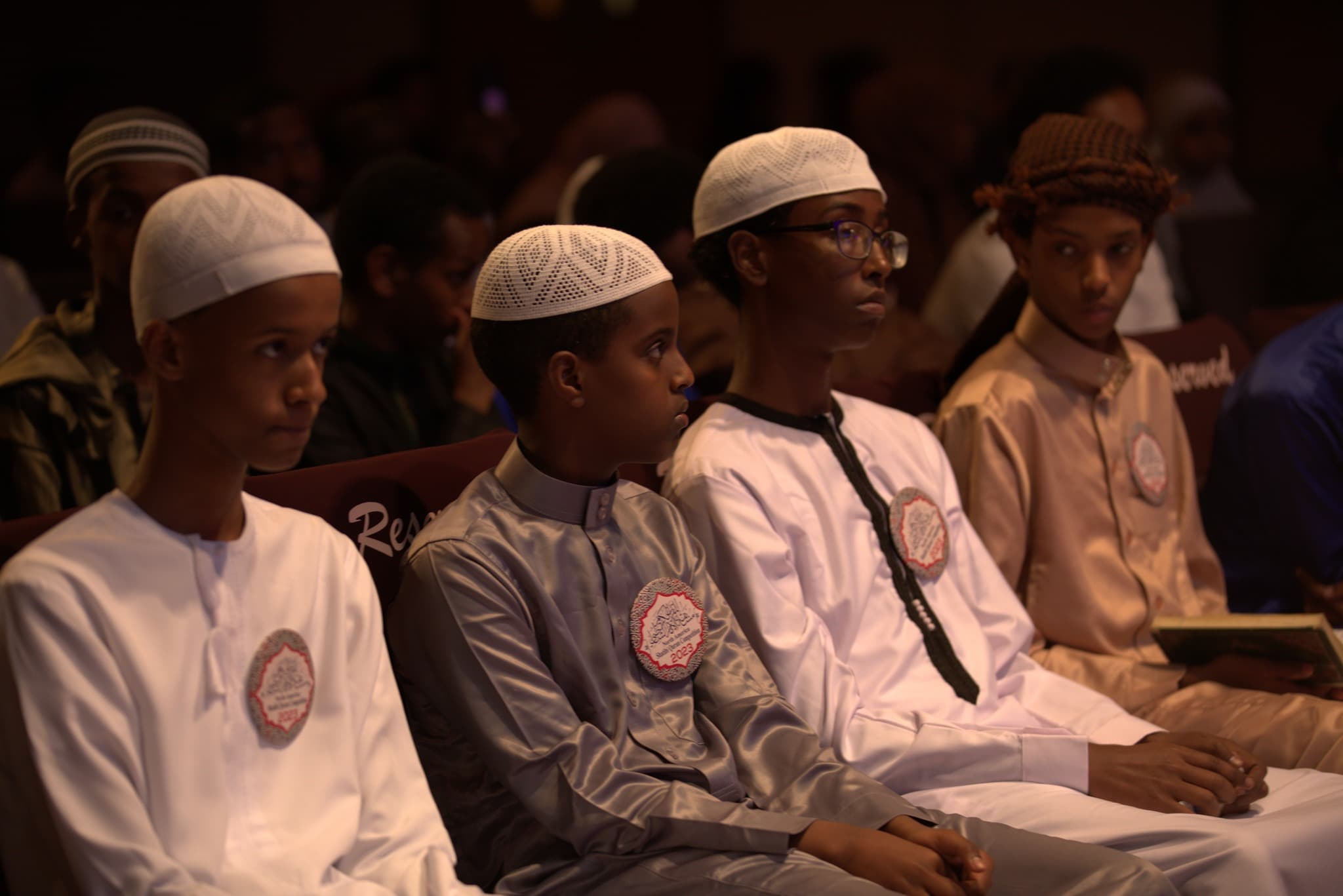A student reciting the Quran during the competition